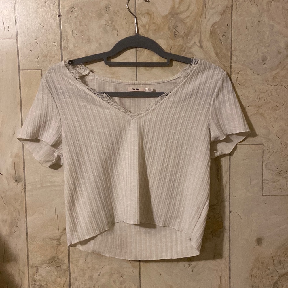 White shirt from Francesca’s with lace detailing.